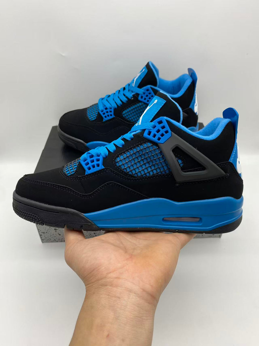 Air Jordan 4 Retro 'Blue Thunder' – Black / Photo Blue