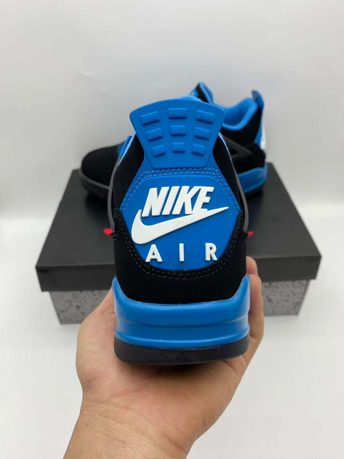 Air Jordan 4 Retro 'Blue Thunder' – Black / Photo Blue