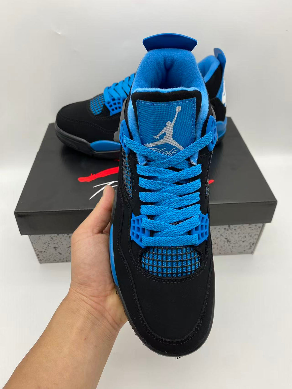 Air Jordan 4 Retro 'Blue Thunder' – Black / Photo Blue