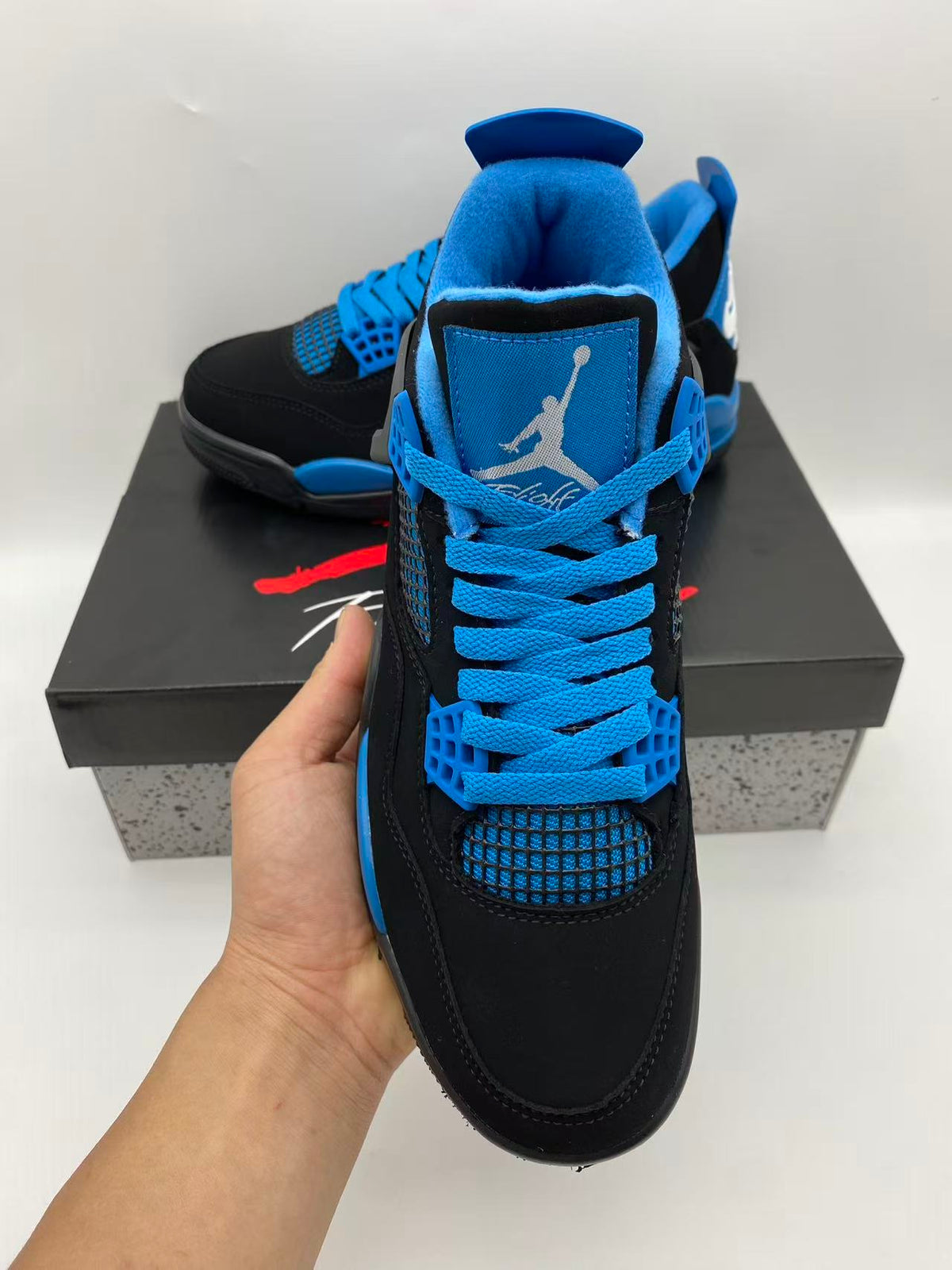 Air Jordan 4 Retro 'Blue Thunder' – Black / Photo Blue